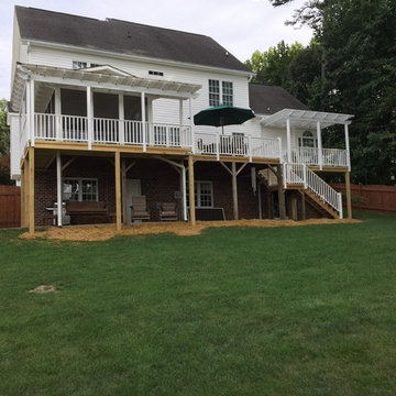 Clemmons, NC Eze Breeze Window Room with Double White Aluminum Pergolas.