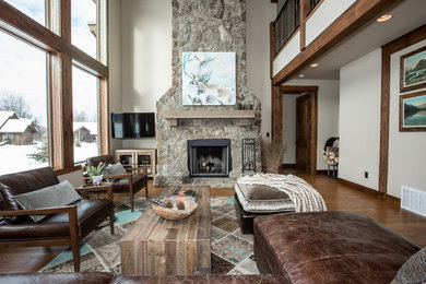 Example of a mountain style family room design in Other