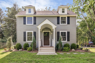 Example of an arts and crafts exterior home design in New York