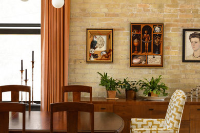 Example of an urban dining room design in Milwaukee