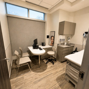 Modern Medical Treatment Room with Custom Cabinetry
