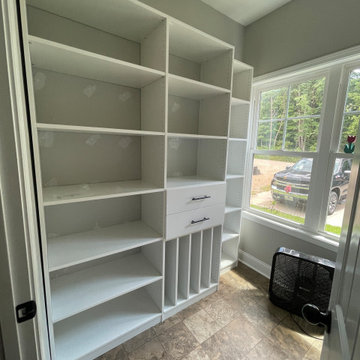 Pantry with Vertical Shelving, Drawers, and Adjustable Open Shelving