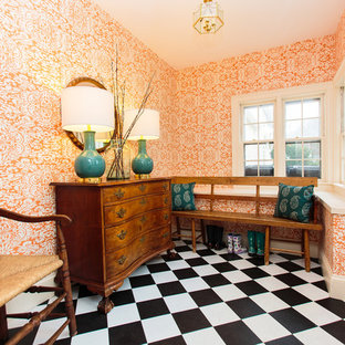 ボストンの片開きドアトランジショナルスタイルのおしゃれなマッドルーム (オレンジの壁、白いドア、マルチカラーの床) の写真