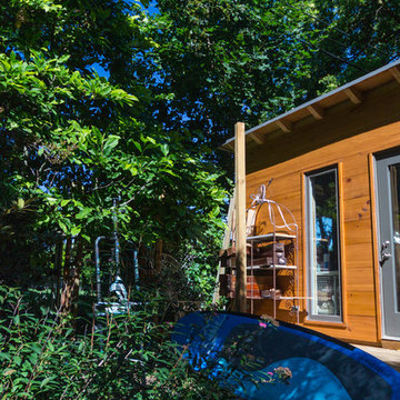 Modern Art Studio Natural 1x12 Pine Siding fully Insulated