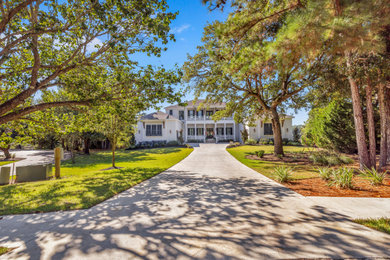 Example of a transitional exterior home design in Other