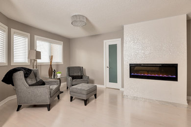 Large trendy light wood floor living room photo in Toronto with a ribbon fireplace and a tile fireplace