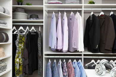 Example of a large minimalist closet design in New York