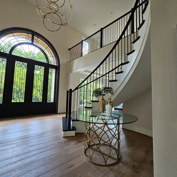 Project #130 | Curved Staircase with Wraparound Balcony