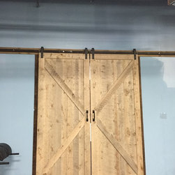 Double Sliding Antique Reclaimed Wood Barn Doors in a Home Gym - Interior Doors