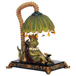 Elk Home - Sleeping King Frog Mini Lamp - Traditionally Frogs Represent Good Omens, Happiness And Great Friendships. The Sterling Sleeping King Frog Mini Lamp Sleeps Under The Shade Of A Lily Pad That Holds (1) 15 Watt Bulb. Decorative Charms Hanging From The Lily Pad Adding A Touch Of Whimsy Along With The Acrylic Beaded Sleeve That Surrounds The Pipe. This Is A Fun And Quirky Night Light For A Bedside Table Or Tucked Away In A Small Corner Of The Living Room, Family Room, Den Or Library. Overall It Stands 12.25 Inches Tall And 10.25 Inches Long X 6.75 Inches Wide And The Shade Measures 3.5 Inches Tall X 6 Inches Long X 6 Inches Wide.