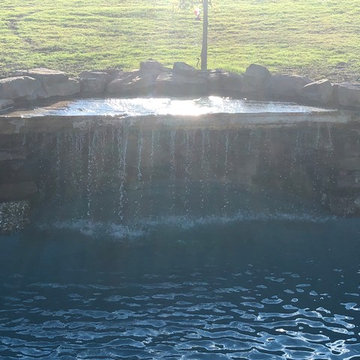 Huge rock grotto for a custom pool build