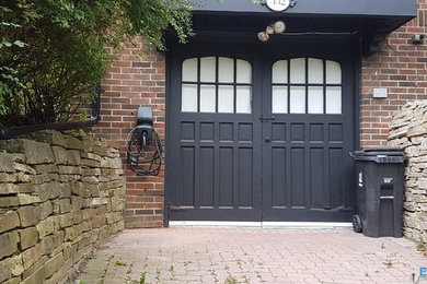 Inspiration for a small timeless attached one-car garage remodel in Toronto