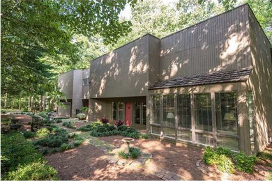 Example of a trendy home design design in Other