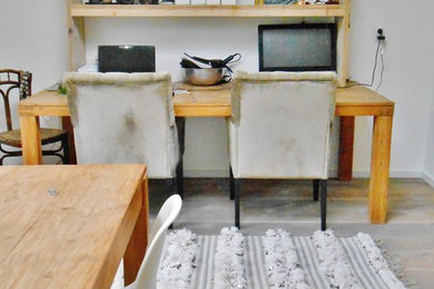 Example of an eclectic home office design in Amsterdam