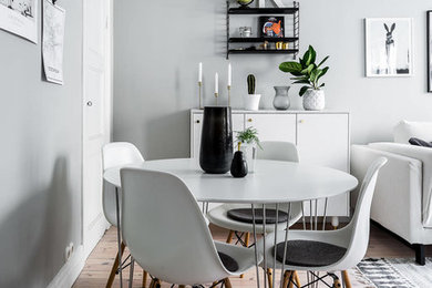 Inspiration for a mid-sized scandinavian dining room in Stockholm.
