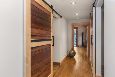 Example of a transitional bedroom design in Seattle