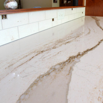 Waypoint Auburn Glaze Cabinets with Cambria Brittanicca Quartz Countertop