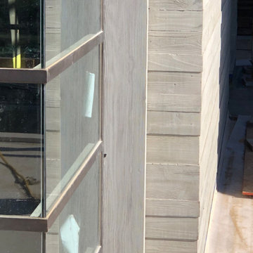 Contemporary Home with Board Formed Concrete and a Precast Cedar Fascia