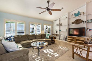 Example of a beach style living room design in Miami