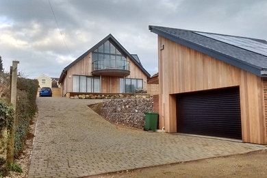This is an example of a contemporary house exterior in Other.
