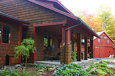 Mid-sized cottage red two-story wood house exterior photo in Boston