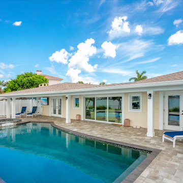 Covered Patio & Waterfront Pool