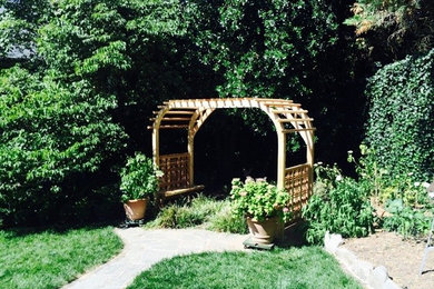 Example of an arts and crafts patio design in Portland