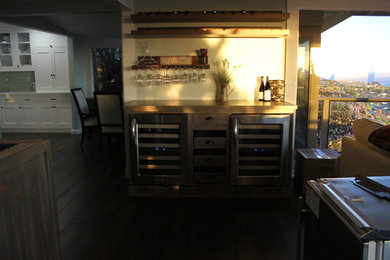 Example of a small classic dark wood floor wine cellar design in Los Angeles