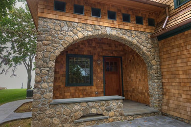 Example of a beach style entryway design in New York