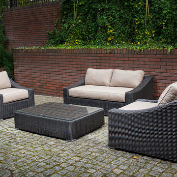 Toja Patio Furniture - Tuscan Love Seat Set - Red Brick Wall