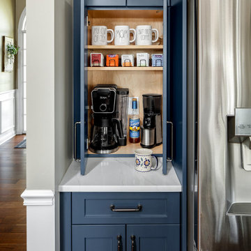 Open Concept Kitchen w/ Blue & White Cabinets & White Countertops
