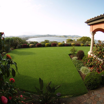 Artificial grass installation on backyard