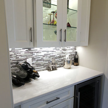 White Kitchen with Gray and Black Quartz Countertop and Bar Area ~ Streetsboro