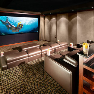 Inspiration for a mid-sized transitional enclosed carpeted and multicolored floor home theater remodel in Newark with brown walls and a projector screen