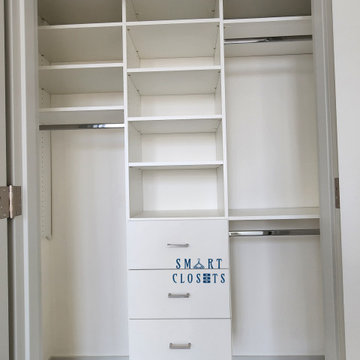 Master Walk In, Guest and Laundry Closet -White Designed By Smart Closets