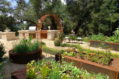 Patio - large traditional backyard stone patio idea in San Francisco