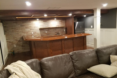 English style Bar/Pub, Finished basement, Custom tiled shower, custom cabinets