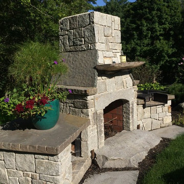Aged Granite and Bluestone Slab Fireplace