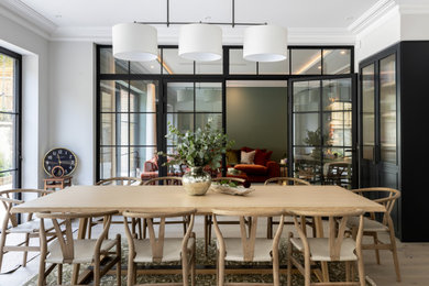 Design ideas for a contemporary dining room in Surrey.