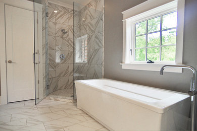 Example of a mid-sized trendy master black and white tile and ceramic tile ceramic tile bathroom design in Atlanta with gray walls, raised-panel cabinets, white cabinets and granite countertops