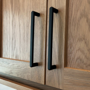 White Oak and Black Split Foyer Modern Kitchen