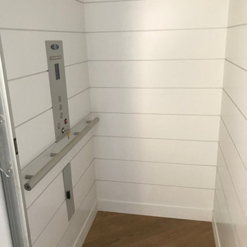 Farmhouse Home Elevator with Custom Shiplap Interior
