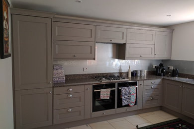 This is an example of a medium sized contemporary kitchen in Cardiff.