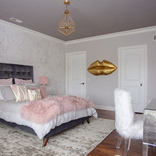 Photo of a medium sized modern teen’s room for girls in Other with white walls and brown floors.