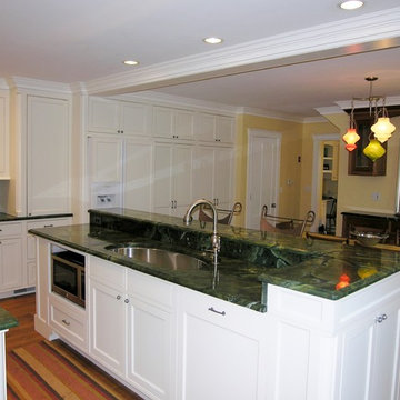 Kitchen Island Combines, Yet Separates 2 Rooms (Now Spaces)