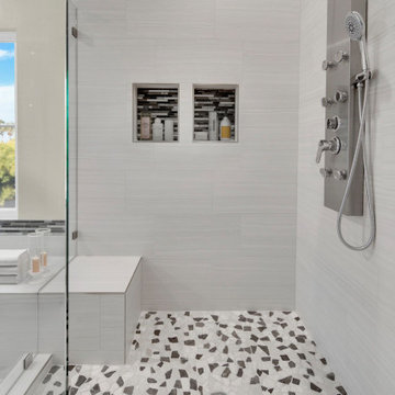 hower Detail with Bench, Niches, and Body Sprays – Laguna Niguel Bathroom Remode