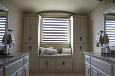 Inspiration for a large transitional master bathroom remodel in Kansas City with raised-panel cabinets, beige cabinets and granite countertops