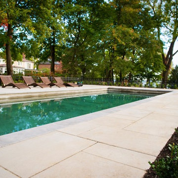 Contemporary pool and backyard in Pointe-Claire
