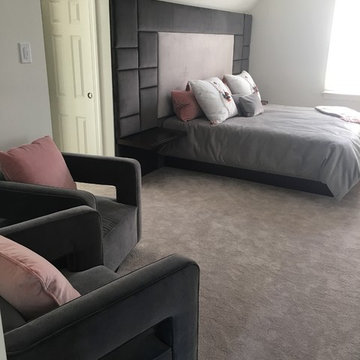 Custom built upholstered bed wall with LED lighting.