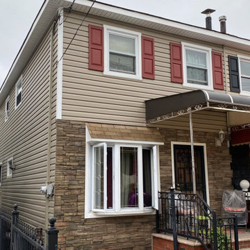 Jamaica Siding - Pebble & Terra Rosa Ledgestone | Alpha Windows & Siding